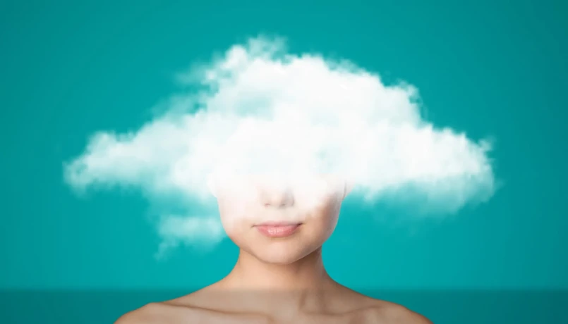 woman with cloud over face