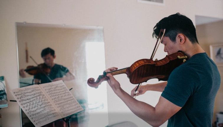 man playing violin