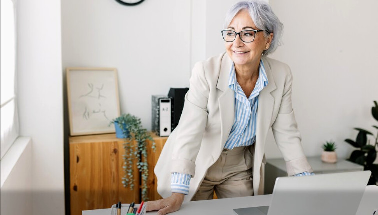 old woman at office desk