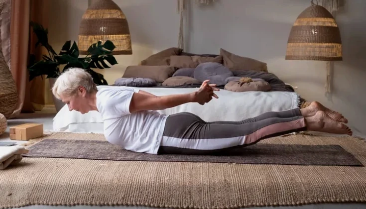 old woman doing yoga