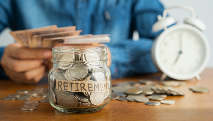 a jar of coins labeled 'retirement'